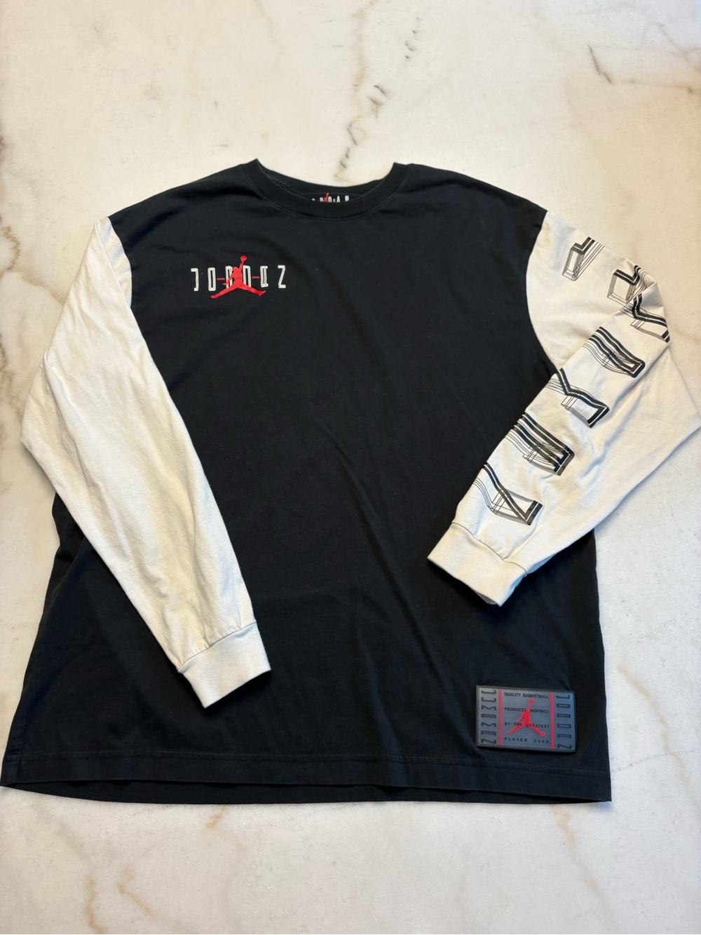 Jordan Black Long Sleeve Tee with White Contrast Sleeves and Red Logo